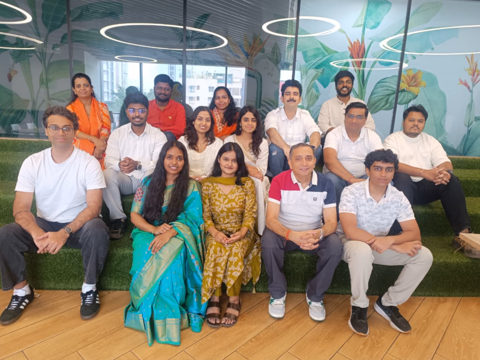 The Improzo team seated together at the office